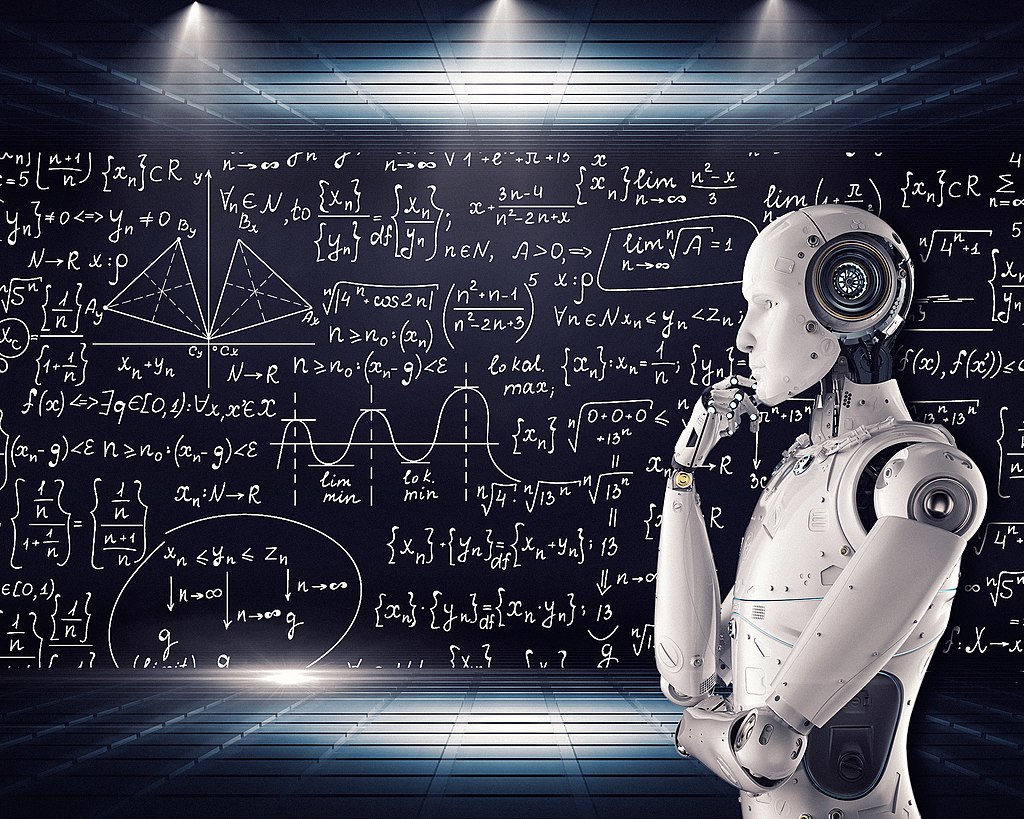 Artificial_Intelligence_&_AI_&_Machine_Learning_-_30212411048 ai bot standing next to a board with mathematical text. Ceiling lights are illuminating the space